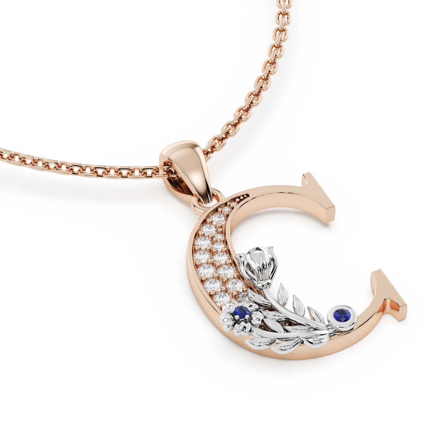 Handcrafted white gold letter C initial pendant from the Everbloom collection, set with diamonds and a rose gold floral motif featuring a round Blue sapphire gemstone.