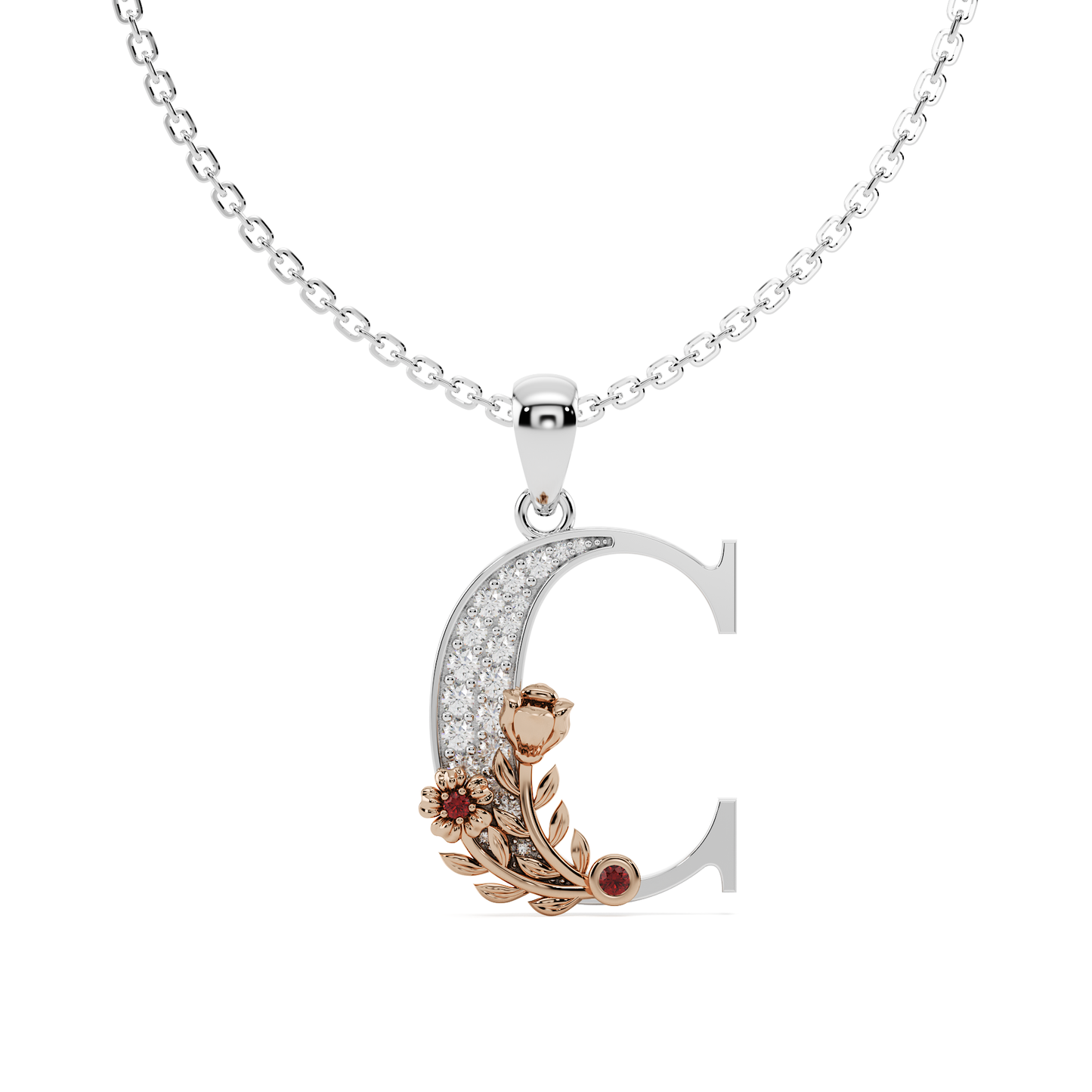 A hand-crafted white gold letter C pendant, entwined with a rose gold floral vine featuring pavé diamonds and a vivid gem quality ruby colour stone.
