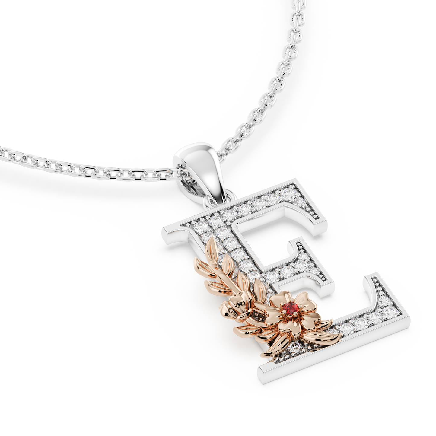 Handcrafted white gold letter E initial pendant from the Everbloom collection, set with diamonds and a rose gold floral motif featuring a round Ruby gemstone.
