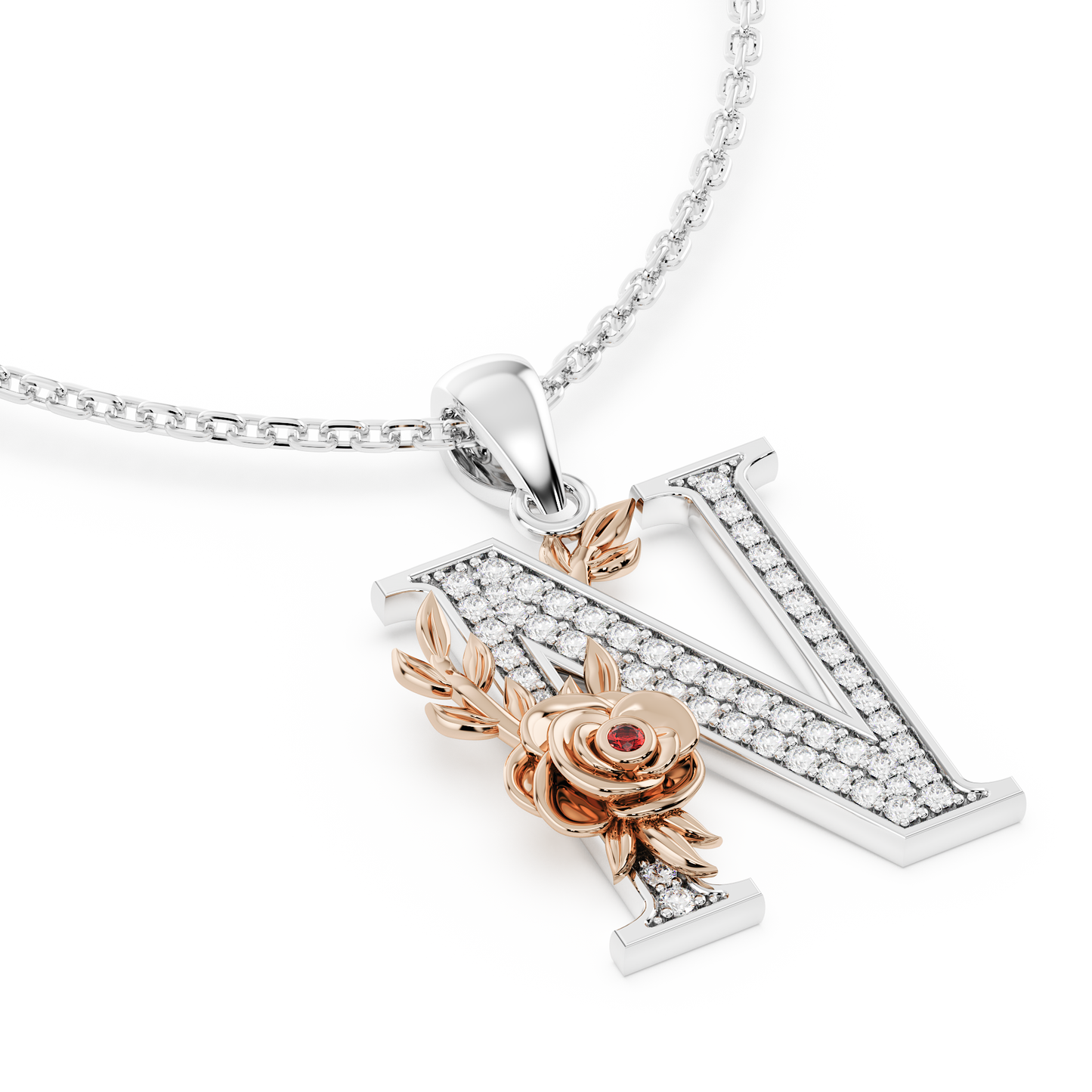 Handcrafted white gold letter N initial pendant from the Everbloom collection, set with diamonds and a rose gold floral motif featuring a round Ruby gemstone.

