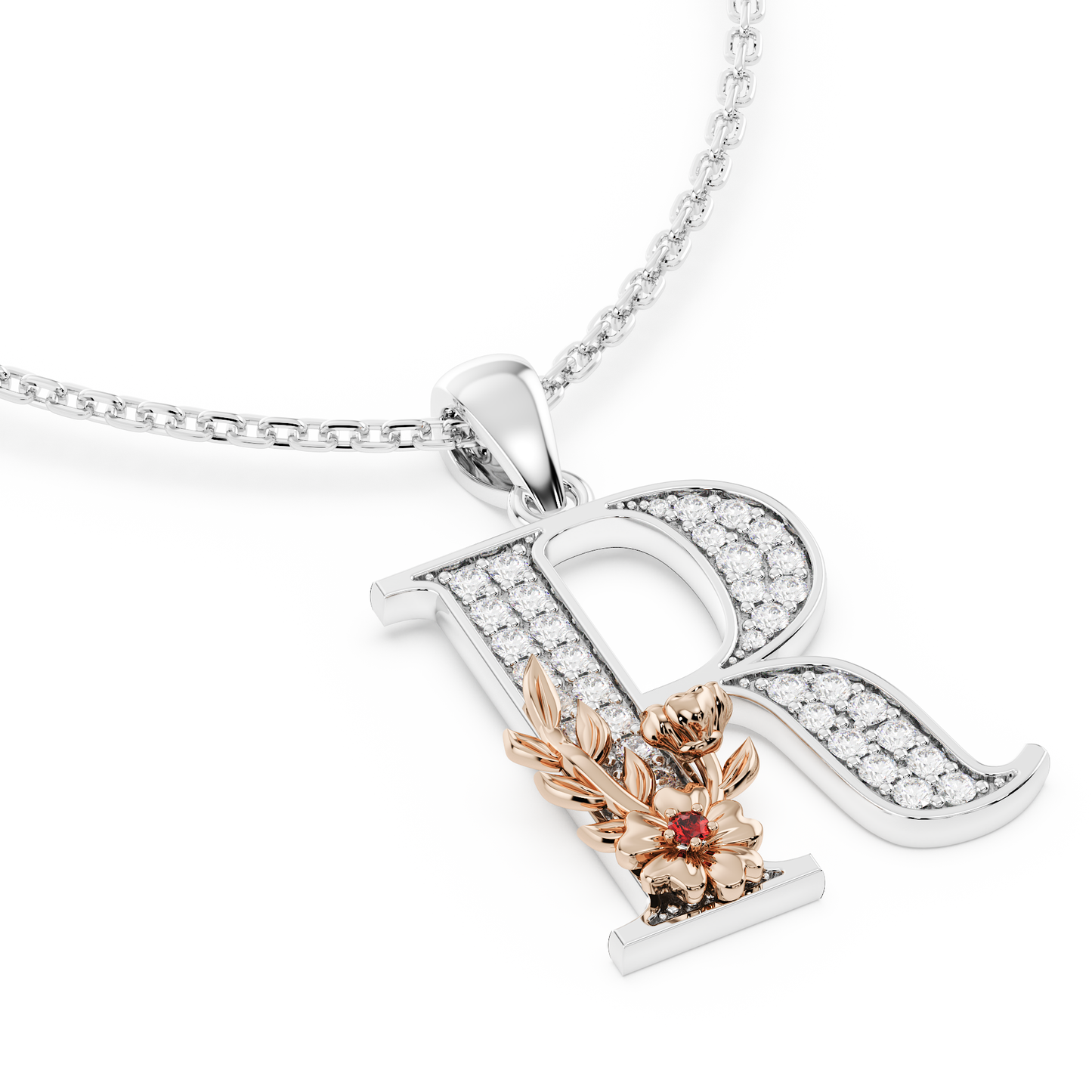 Handcrafted white gold letter R initial pendant from the Everbloom collection, set with diamonds and a rose gold floral motif featuring a round Ruby gemstone.