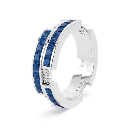 A white gold ring set in diamonds, featuring two rows of princess-cut diamonds and in between seperated by round white diamonds.
